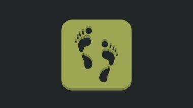 Siyah arkaplanda izole edilmiş Yeşil İnsan ayak izi simgesi. İnsan ayağı izi. 4K Video hareketli grafik canlandırması.