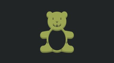 Yeşil oyuncak peluş oyuncak ikonu siyah arka planda izole edildi. 4K Video hareketli grafik canlandırması.