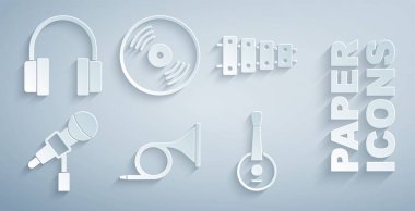Trompet, ksilofon, mikrofon, banjo, vinil disk ve kulaklık simgesini ayarla. Vektör
