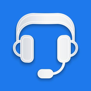 Kağıt kesiği kulaklık simgesi mavi arkaplanda izole edilmiş. Kulaklıklar. Müzik, hizmet, iletişim ve operatör konsepti. Kağıt sanatı tarzı. Vektör