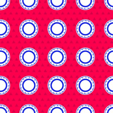 Mavi araba tekerleği ikonu, kırmızı arka planda izole edilmiş pürüzsüz desen. Vektör