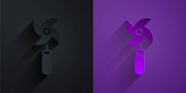 Kağıt kesikli fırıldak oyuncağı simgesi mor arka planda siyah üzerine izole edilmiş. Yel değirmeni oyuncak ikonu. Kağıt sanatı tarzı. Vektör.