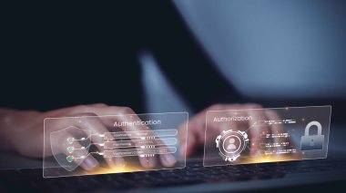 User hand typing name and password to login to access system with user-level access management. Concept of managing personal access level in organization and managing content access by member level.