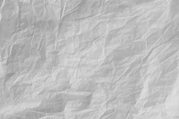 white wax paper background texture. Crumpled stencil surface close - up