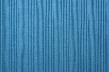 Mavi kumaş arka plan, beyaz ile değişen dikey bir desen..