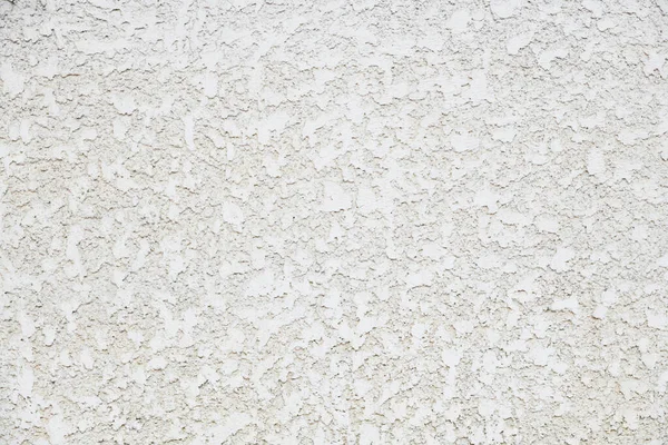 白いコンクリートの白い背景は表面の質をブラシをかけました ロイヤリティフリーのストック画像
