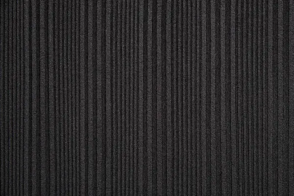 Dark fabric texture close-up. Clothes background