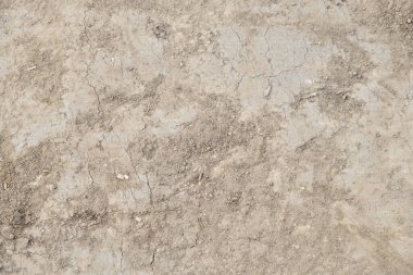 Doğal toprak dokusu yüzey ve arkaplan, üst görünüm yakın plan, kahverengi toprak