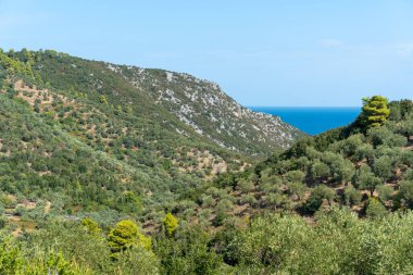 Denizin, dağların, kayaların, plajların, adaların ve Yunanistan 'ın farklı yerlerinden gökyüzünün manzarası.