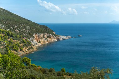 Denizin, dağların, kayaların, plajların, adaların ve Yunanistan 'ın farklı yerlerinden gökyüzünün manzarası.