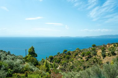 Denizin, dağların, kayaların, plajların, adaların ve Yunanistan 'ın farklı yerlerinden gökyüzünün manzarası.