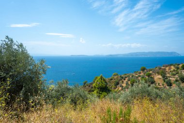 Denizin, dağların, kayaların, plajların, adaların ve Yunanistan 'ın farklı yerlerinden gökyüzünün manzarası.