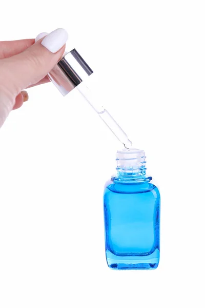 stock image Anti-aging ampoule serum with collagen in blue bottle isolated on white background.