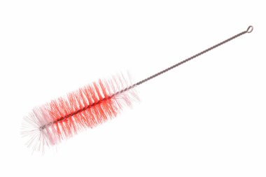 Bottle brush with orange bristles isolated on white background. clipart