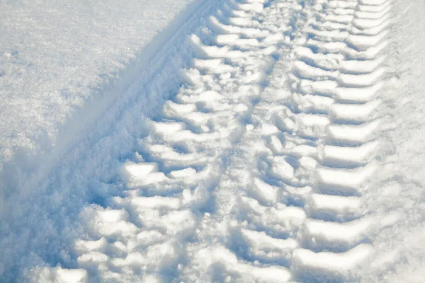 Huellas Ruedas Superficie Nieve Día Invierno Soleado —  Fotos de Stock