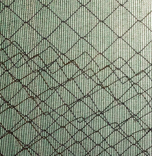 Metal mesh fence and synthetic fabric. Industrial background.