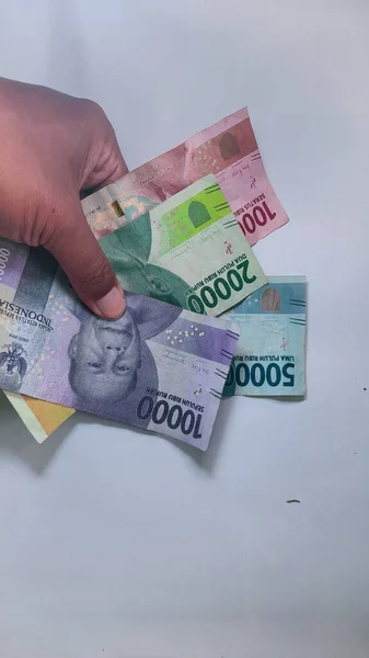 Indonesisches Geld Händen Isoliert Weiß — Stockfoto