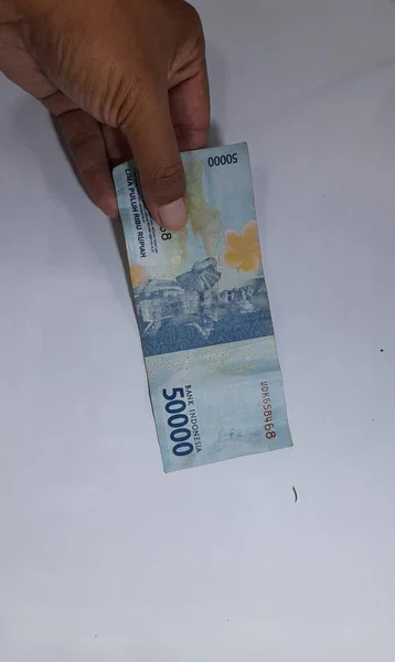 Indonesisches Geld Händen Isoliert Weiß — Stockfoto