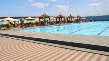 Swimming pool with blue sky background