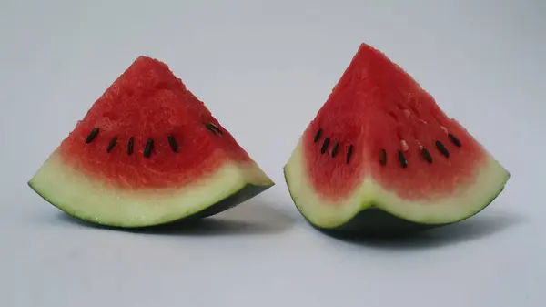 stock image Sliced fresh watermelon isolated on white background. Red, white, black, and green color. copy space