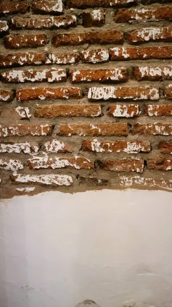 Moldy brick wall background, Worn brick wall, old crack wall background