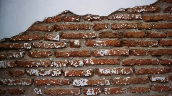 Moldy brick wall background, Worn brick wall, old crack wall background