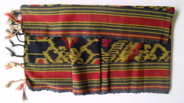 Endonezya 'dan eşsiz desenli el yapımı, desenli çok renkli etnik kumaş arka planı.