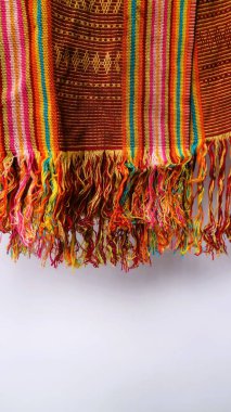 Endonezya 'dan eşsiz desenli el yapımı, desenli çok renkli etnik kumaş arka planı.