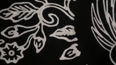 Dönen desenli çok renkli etnik kumaş arka plan, el yapımı, Endonezya 'dan eşsiz desenli tekstil., 