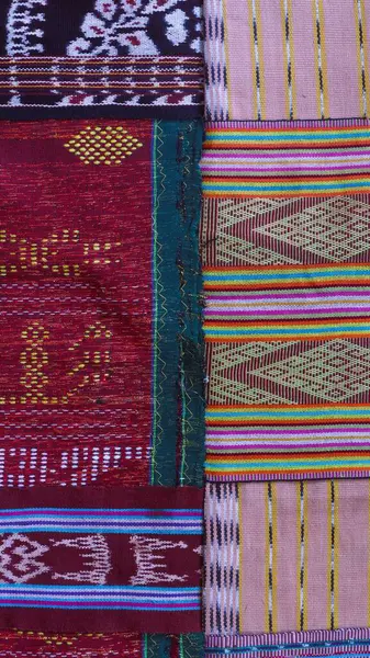Various pattern handmade woven fabric from Indonesia, multicolor geometric textured textile background