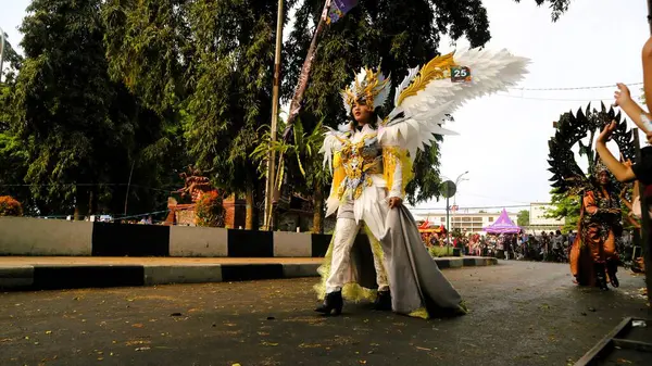 stock image Malang, Indonesia, August 25 2024: Malang Flower Carnival, fashion parade that defines flowers as Identity of Malang City. Combining art elements, culture, tourism and history as a show-off moments for local artist