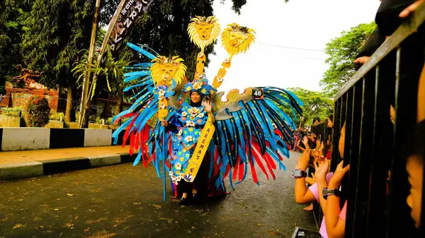 stock image Malang, Indonesia, August 25 2024: Malang Flower Carnival, fashion parade that defines flowers as Identity of Malang City. Combining art elements, culture, tourism and history as a show-off moments for local artist