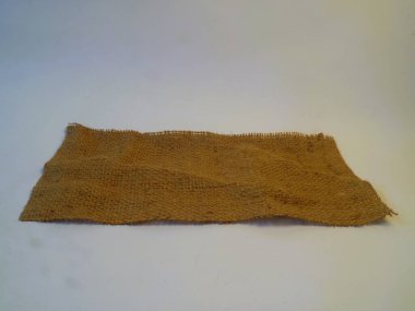 Kırsal bir çuval beyazı izole edilmiş beyaz arkaplan, kaliteli DIY ürünleri kataloğu için mükemmel desenli arkaplan, kopyalama alanı