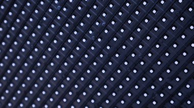 A mesmerizing array of illuminated pixels, captured in close up, reveals a vibrant, textured black background of countless white dots, symbolizing the digital revolution and the intricate modern technology concept, pattern of luminous white dots clipart