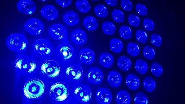 Gleaming, multi-colored lights in green, blue, red, and yellow create a sparkling background perfect for a party, celebration, or victory, 4k footage