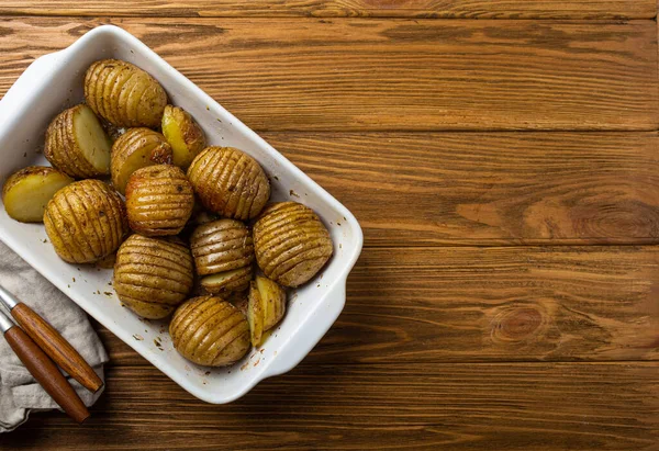 Hasselback Potatoes Herbs White Ceramic Casserole Dish Wooden Rustic Table — Stock Photo, Image