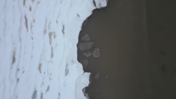 Aerial Top Shot Flying Sea Shore Broken Ice Pieces Washing — Stockvideo