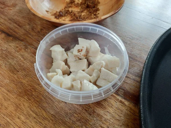 Bowl with little white pieces of fermented shark (Hakarl)