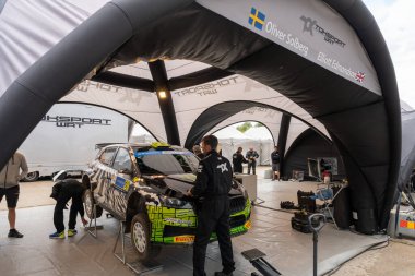 Tartu, Estonia - 07.20.2023: Oliver Solberg and Elliott Edmondson WRC car at WRC Rally Estonia 2023 service park clipart