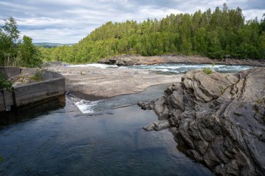 Malselvfossen waterfall in Norway in summer clipart