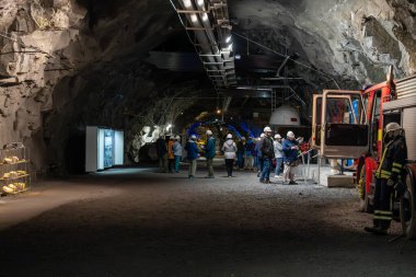 Kiruna, Sweden - 07.09.2024: Tourists in iron ore mine visitor centre owned by LKAB clipart