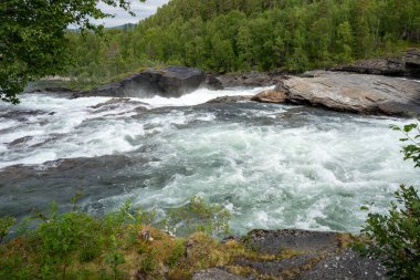 Malselvfossen waterfall in Norway in summer clipart