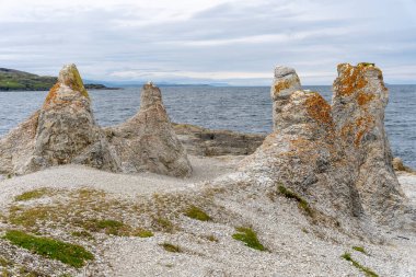 Trollholmsund dolomite rock formations next to Porsangerfjord in Norway clipart