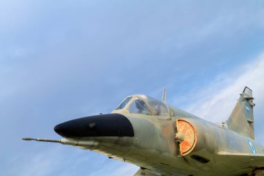 Rio Gallegos, Argentine - May 26, 2023 : mannequin representing a pilot of a Mirage M5 Mara plane giving the impression of flight, monument to the air force pilot, veterans day and fallen in Malvinas clipart