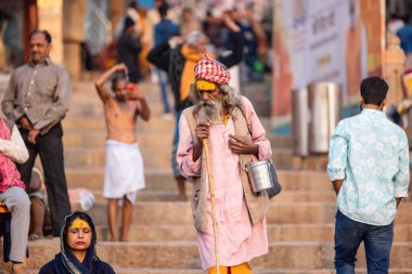 Varanasi, Uttar Pradesh, India - November 2022: Portrait of Unidentified Indian people near river ganges in varanasi city.