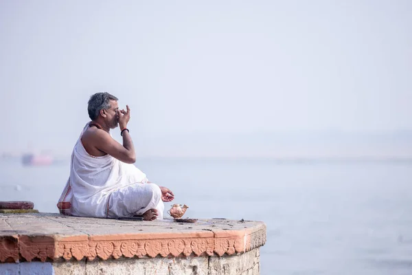 stock image Varanasi, Uttar Pradesh, India - November 2022: Portrait of Unidentified Indian brahmin priest on ghat near river ganges in varanasi city.