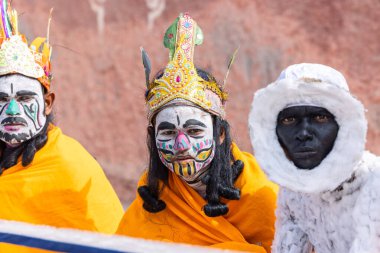 Bikaner, Rajasthan, India - January 2023: Camel festival, Portrait of young artist with painted face of animal while participating in the parade of annual camel festival in Bikaner. Selective focus.