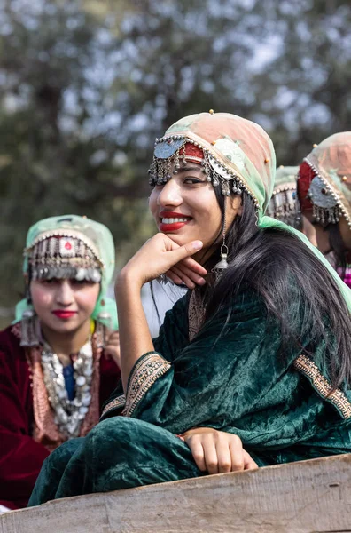 stock image Bikaner, Rajasthan, India - January 2023: Portrait of an young beautiful girl from kashmir in traditional dress smiling while participating in bikaner camel festival parade.