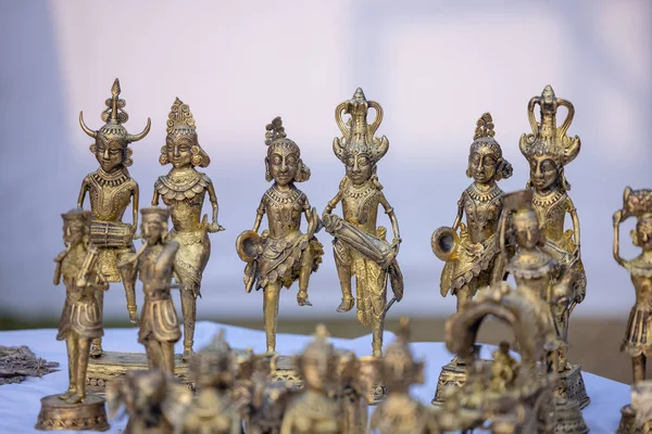 stock image Brass metal art, Handmade indian cultural sculpture souvenir made with brass with plain background. Selective focus.