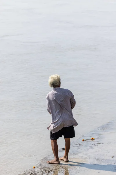 stock image Rishikesh, Uttarakhand, India - October 2022: Portrait of an unidentified hindu preist performing hindu rituals near river ganga at rishikesh.